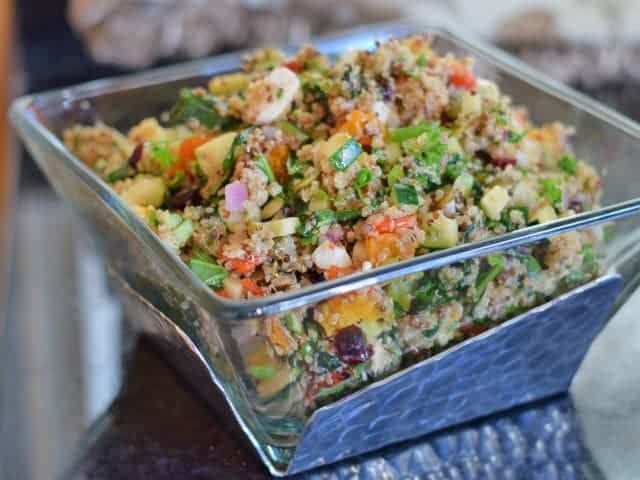 colorful harvest salad with quinoa in glass dish
