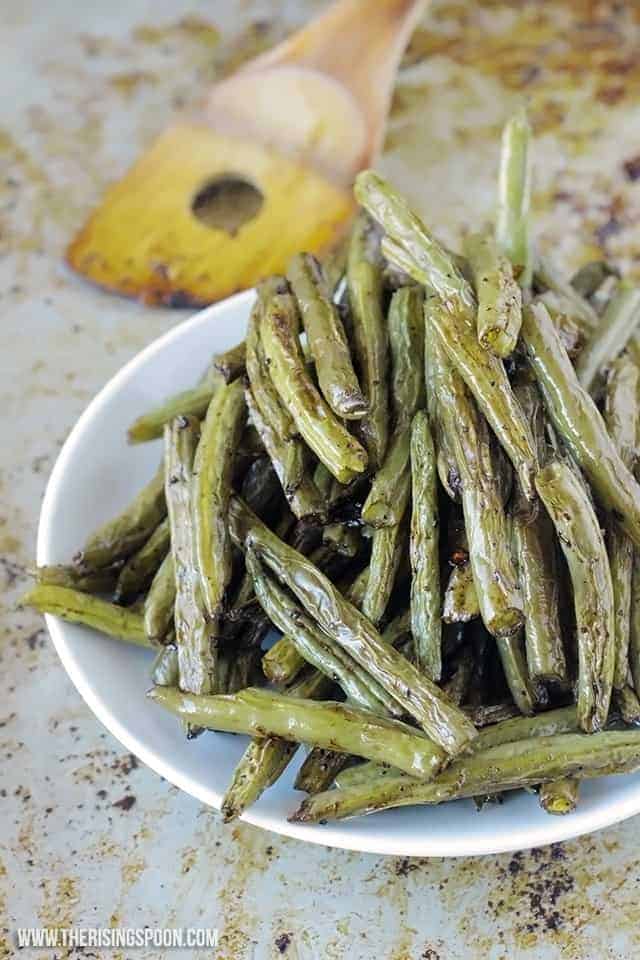 perfectly roasted green beans on plate