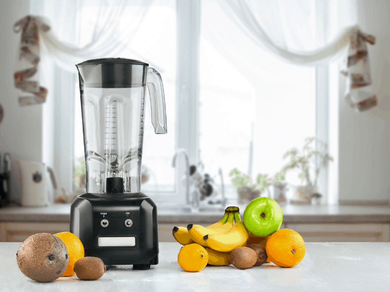 blender on counter with fruit for the best smoothie for weight loss