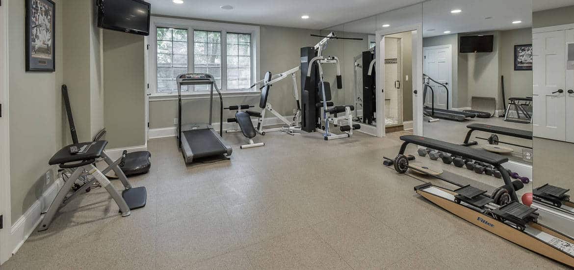 home workout room with light flooring 
